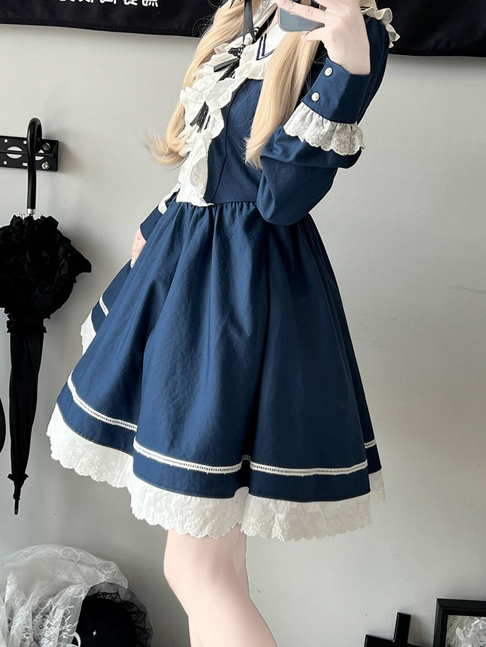 Dunkelblaues, langärmliges Kleid mit Rüschenbesatz über dem Knie