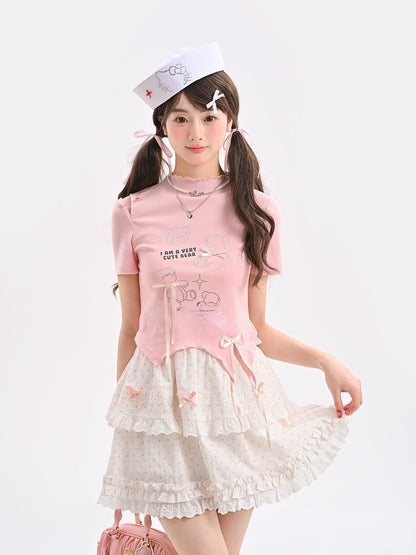 T-Shirt-Saum, gebogen, rosa Rüschen-Ausschnitt, Teddybär-Strasssteine, Schleifen-Akzente