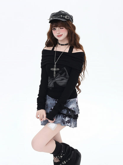 ブラックのオフショルダーネックラインの蝶結びプリントトップス
