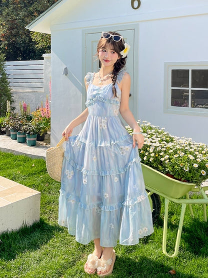 Ärmelloses Kleid mit Blumenstickerei, gestuftem blauem Chiffon und Flatterrock