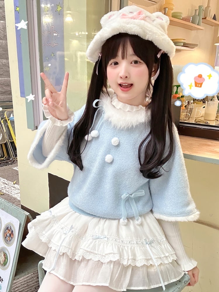 ブルーのプラッシュトリムのリボンとポンポンのセーターとホワイトのフリルカフトップセット