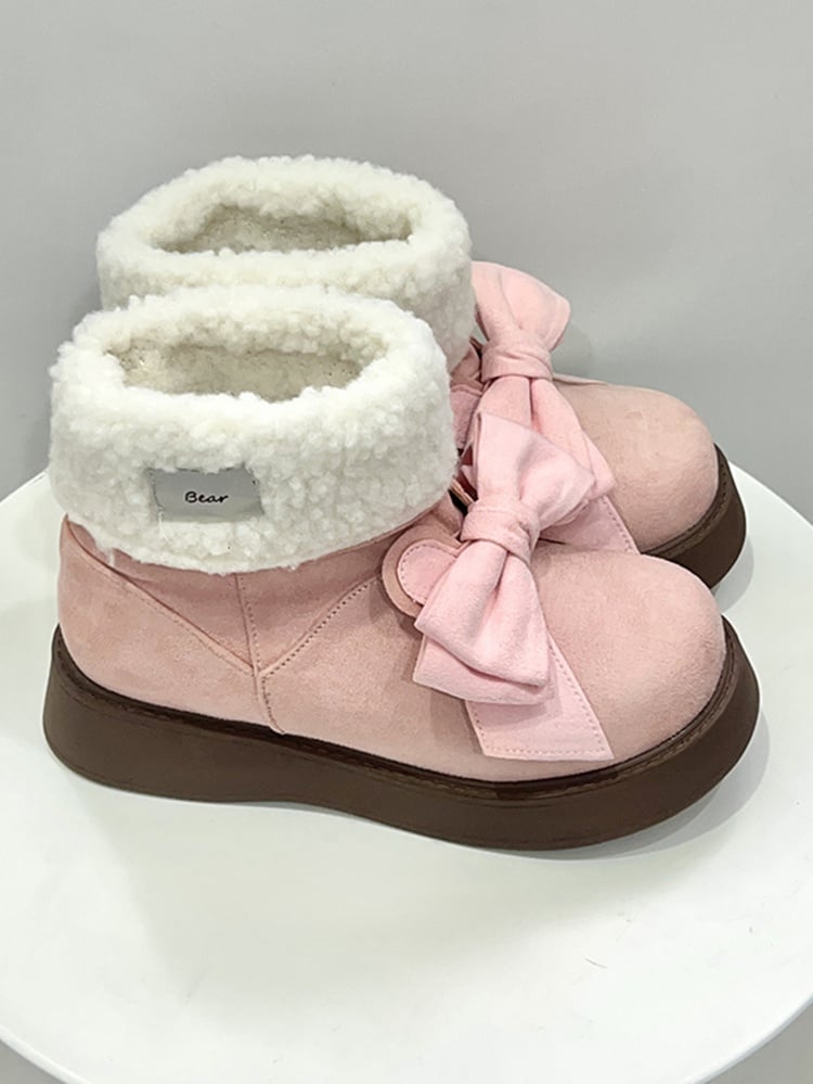 Rosa Ugg-Stiefel mit Schleife und Hasenohren-Design
