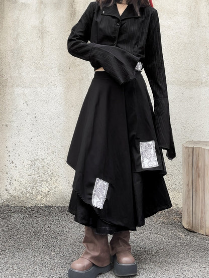 Schwarze asymmetrische Punk-Hose mit weitem Bein und Applikationen