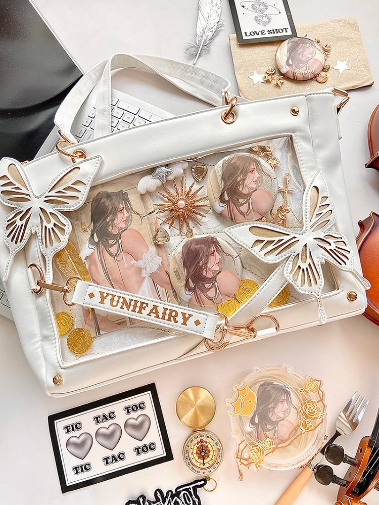 Abnehmbare Ita-Umhängetasche in Gold mit Schmetterlings- und Spinnennetz-Detail in Weiß