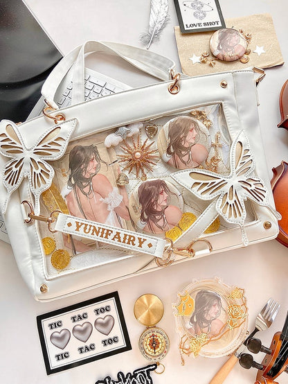 Abnehmbare Ita-Umhängetasche in Gold mit Schmetterlings- und Spinnennetz-Detail in Weiß