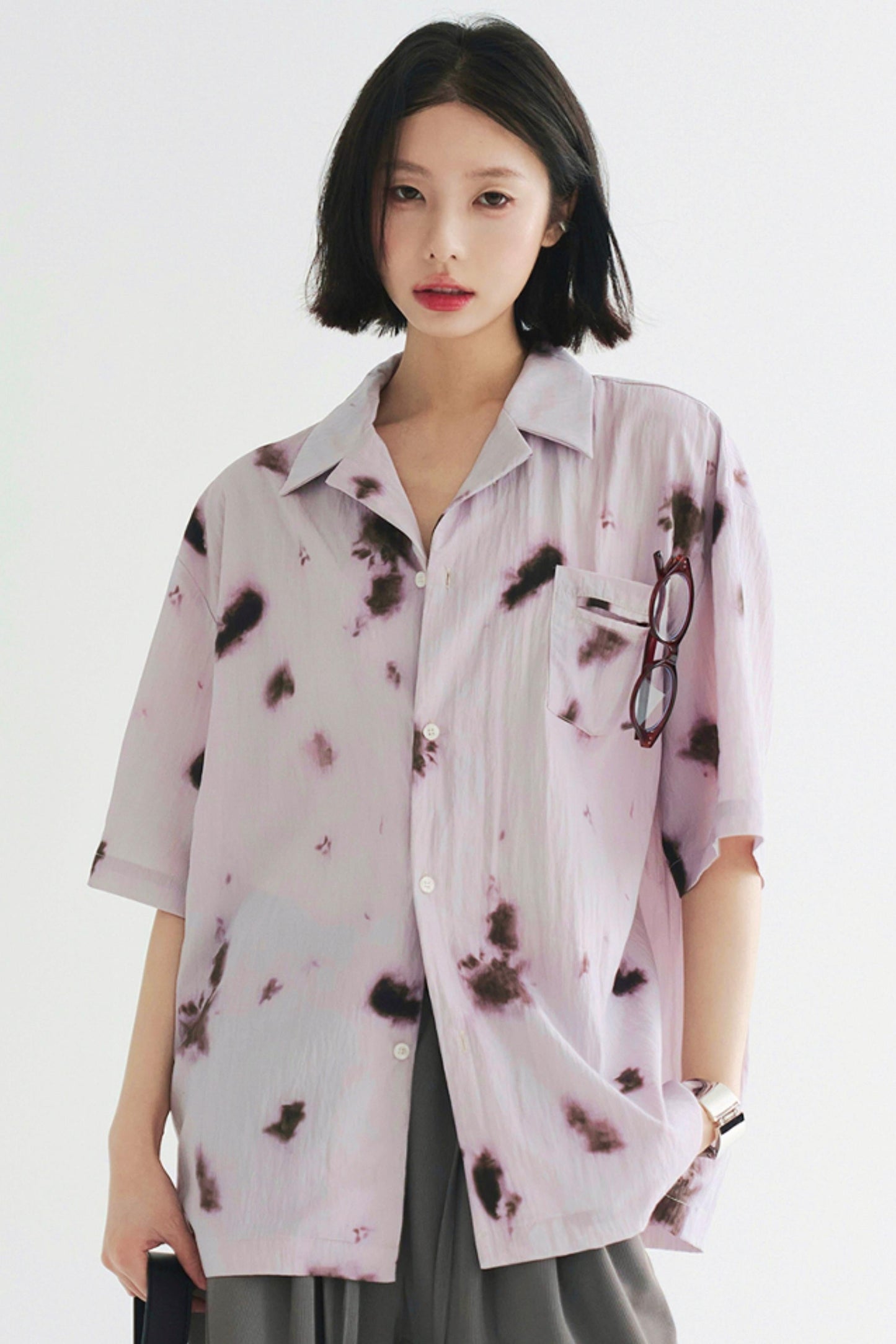 プリーツ風のソフトモーショントップス