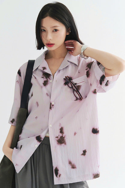 プリーツ風のソフトモーショントップス