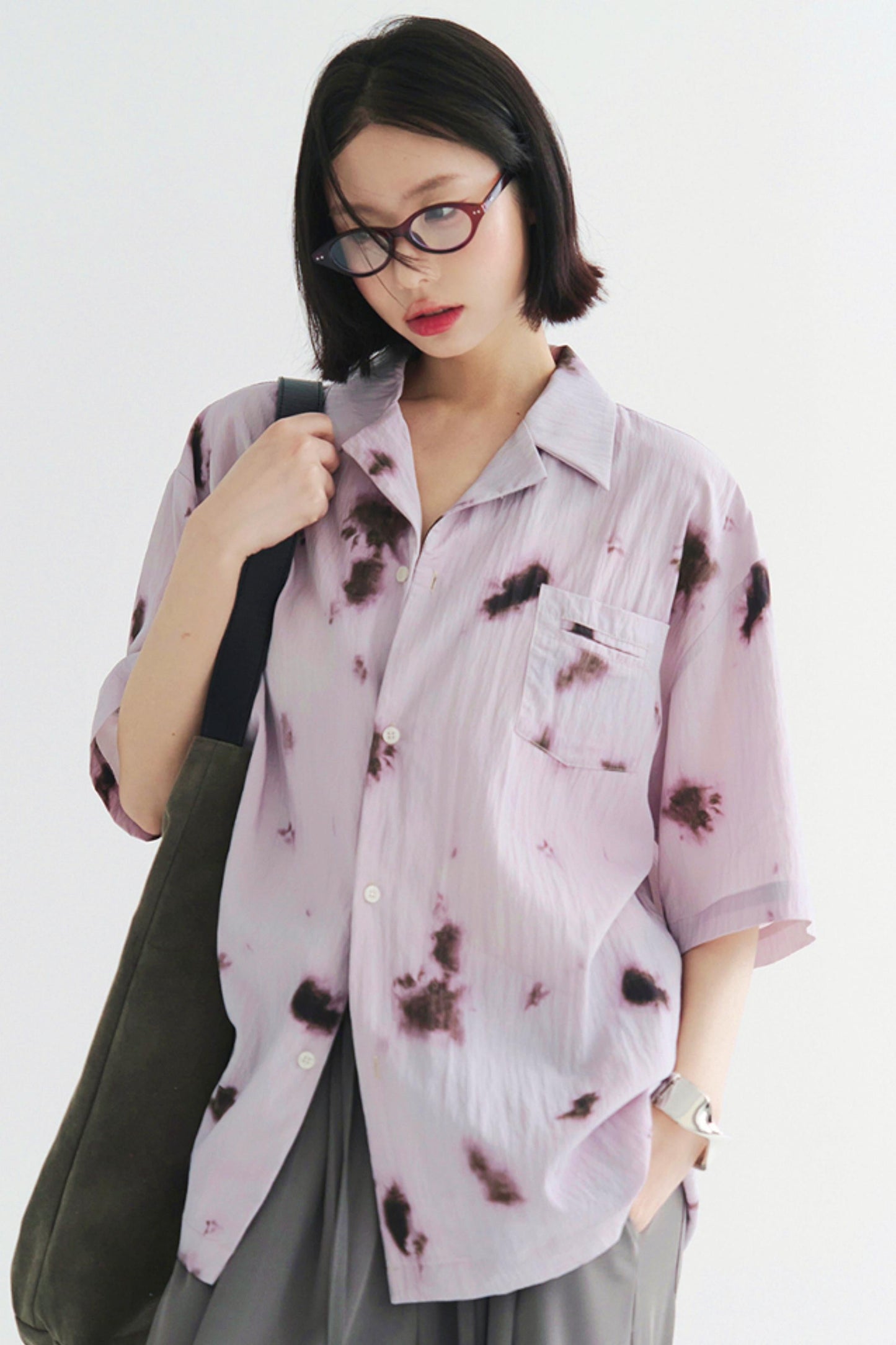 プリーツ風のソフトモーショントップス