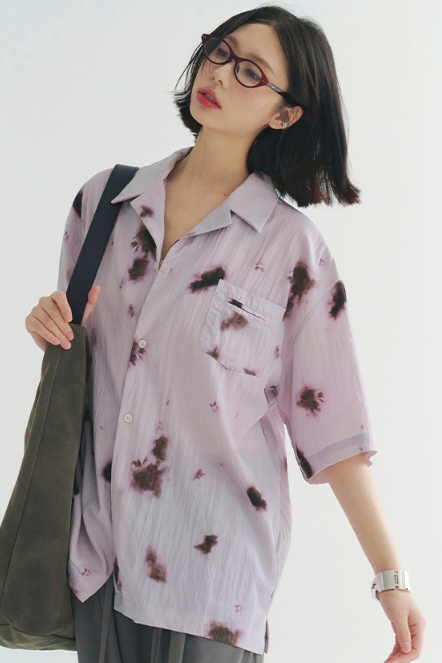 プリーツ風のソフトモーショントップス