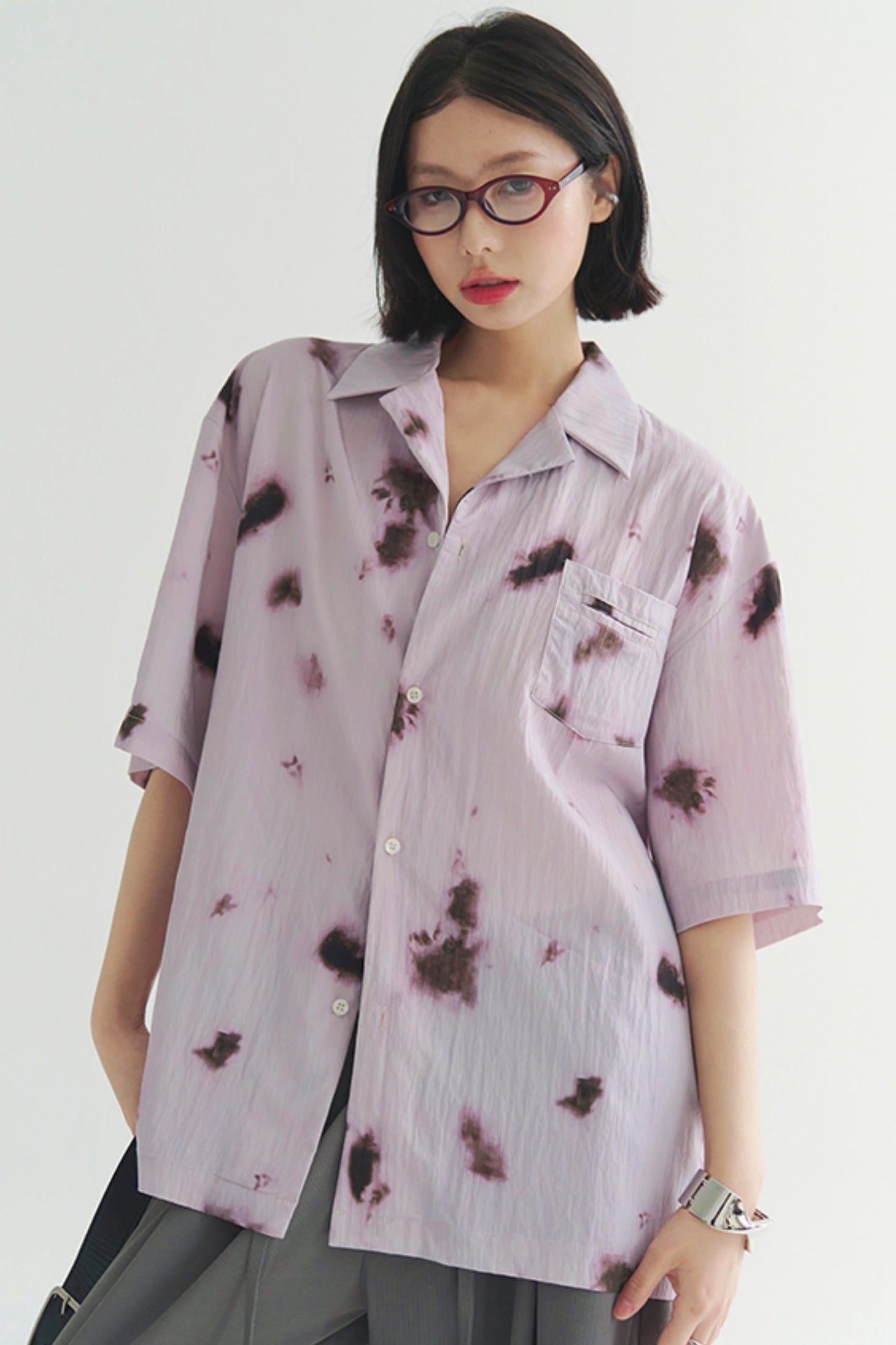 プリーツ風のソフトモーショントップス