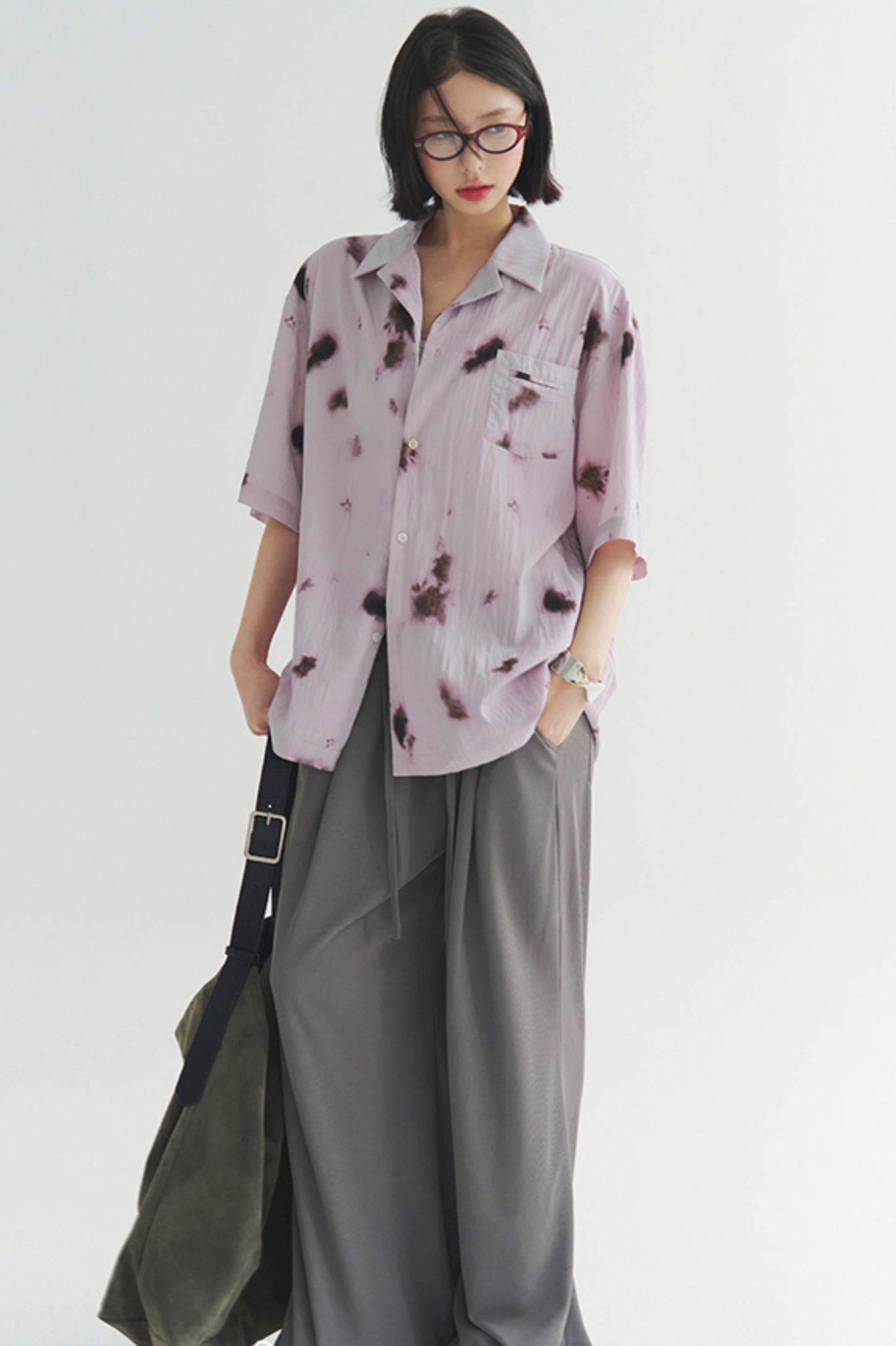 プリーツ風のソフトモーショントップス