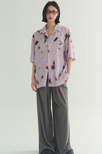 プリーツ風のソフトモーショントップス