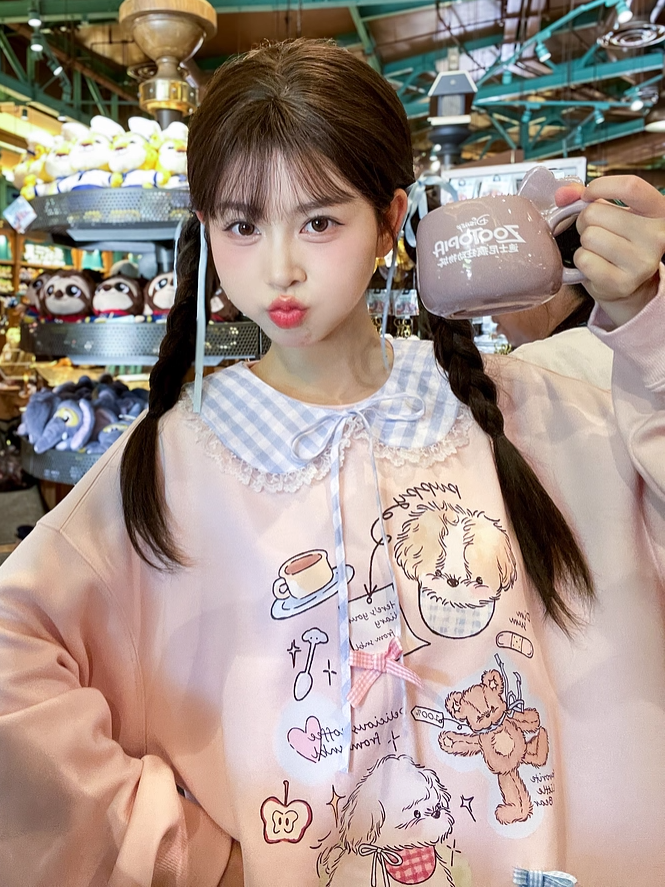 愛らしい漫画の子犬プリントのピンクのラウンドネックルーズスウェットシャツ