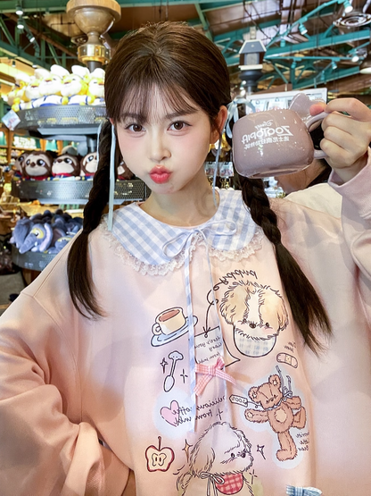 愛らしい漫画の子犬プリントのピンクのラウンドネックルーズスウェットシャツ