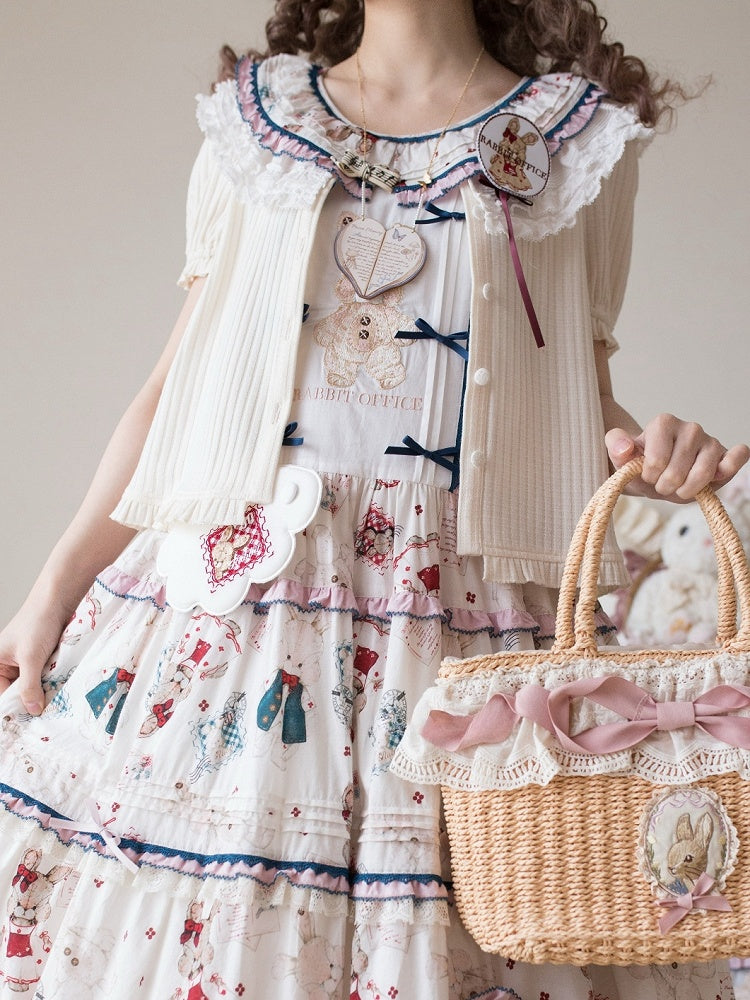 Gelbe Strickjacke mit kurzen Puffärmeln