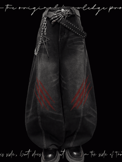 Weite Jeans mit verblasstem Kratzmuster und Used-Look im Punk-Look in verwaschenem Schwarz