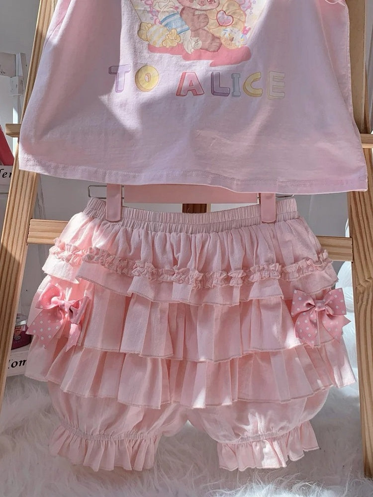 ピンクの伸縮性ウエスト、蝶結び、サイドアクセント、ティアードフリル、ブルマー