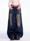 Dunkelblaue Vintage-Jeans mit weitem Bein und Distressed-Löchern
