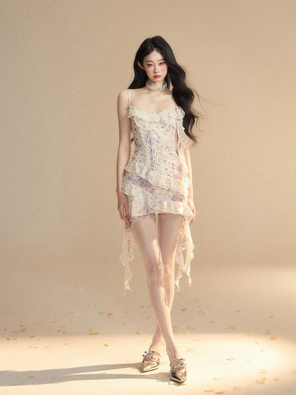 Kleid mit Schnürdetail am Saum, florales Apricot, Rüschen am Unterteil, asymmetrische Vorderseite