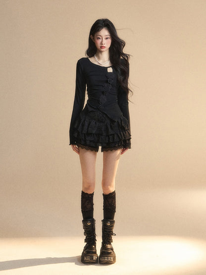 Schwarzes Top mit rundem, glamourösem Detail und gestricktem Halsausschnitt, Blumenverzierung und Cut-Outs