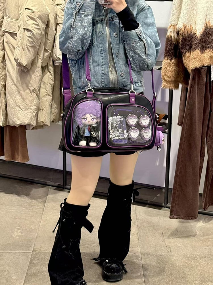 Brotförmige Ita-Umhängetasche in Schwarz und Lila mit Kontrastbesatz