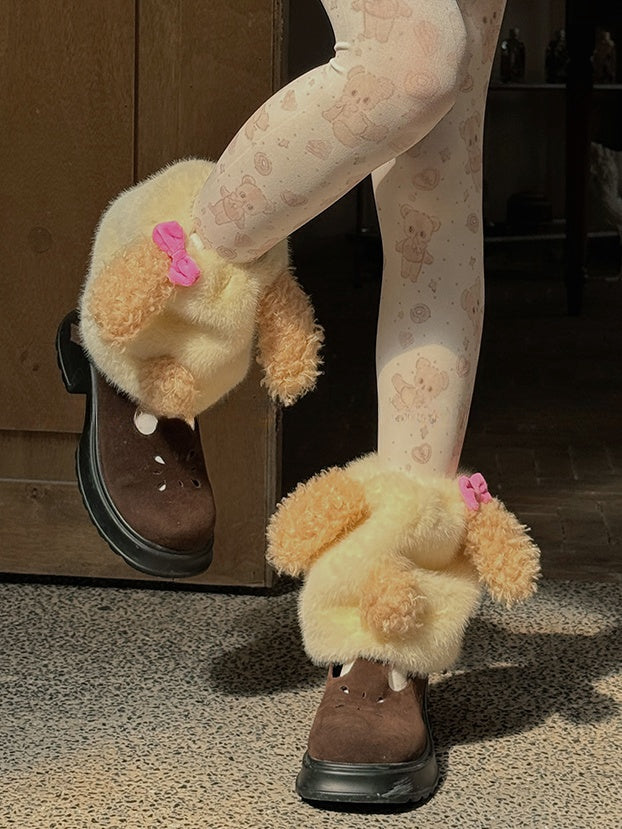 Cremegelbe süße Plüsch-Beinwärmer mit Schleife und Welpenmotiv