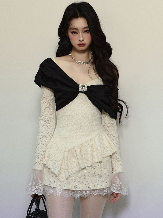 Aprikosenfarbenes Spitzentop mit großer Schleife, asymmetrischem Saum, V-Ausschnitt und langen Ärmeln