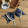 Blue Tassel Train White with Decorations Bow Dark