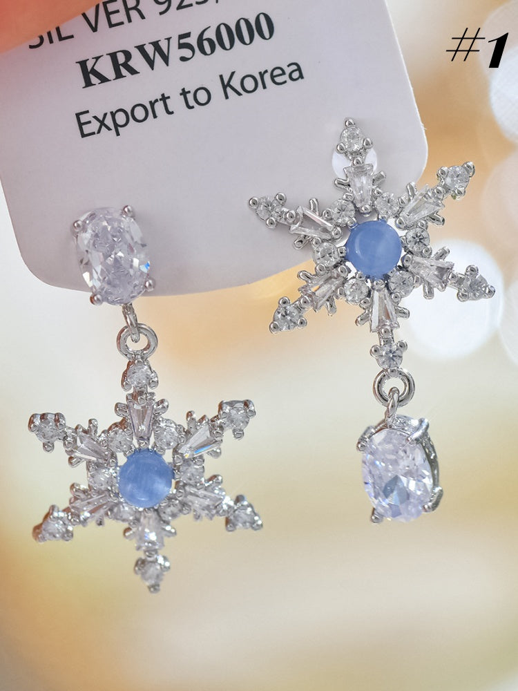 Silberne Ohrringe/Ring/Halskette in Schneeflockenform