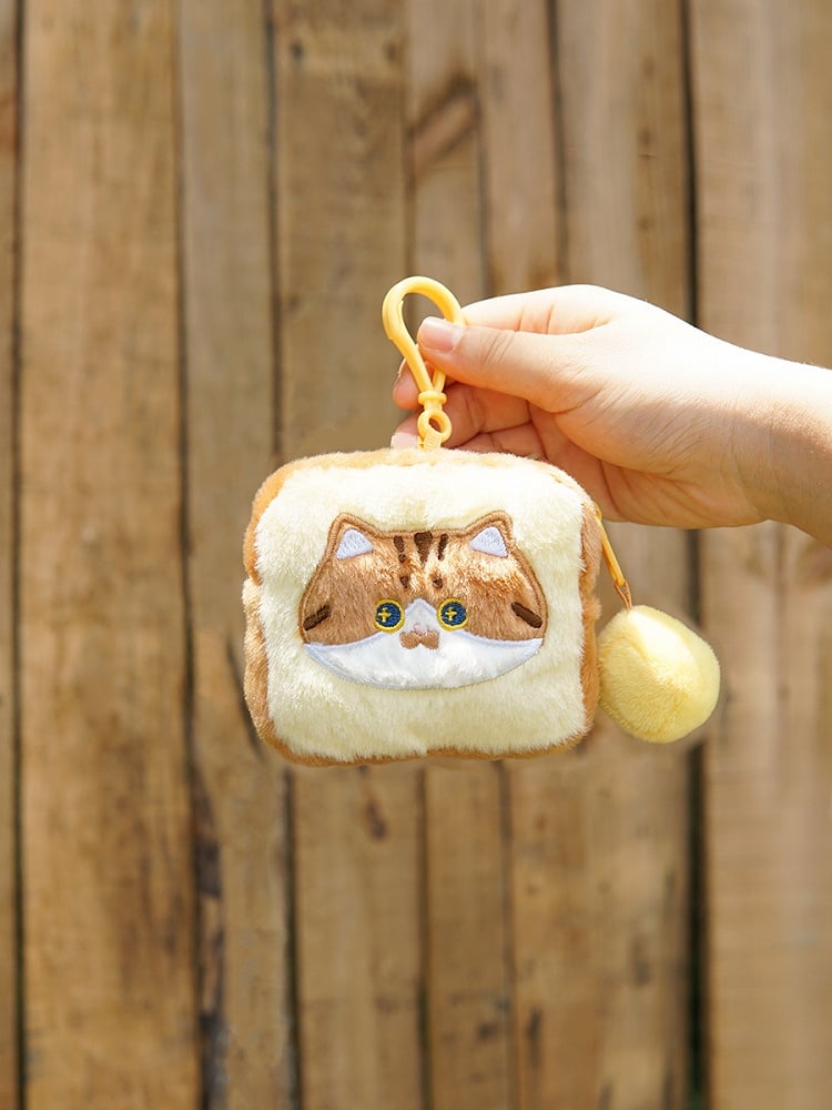 かわいいキティ柄のイエロー＆ブラウンの漫画風コインケース