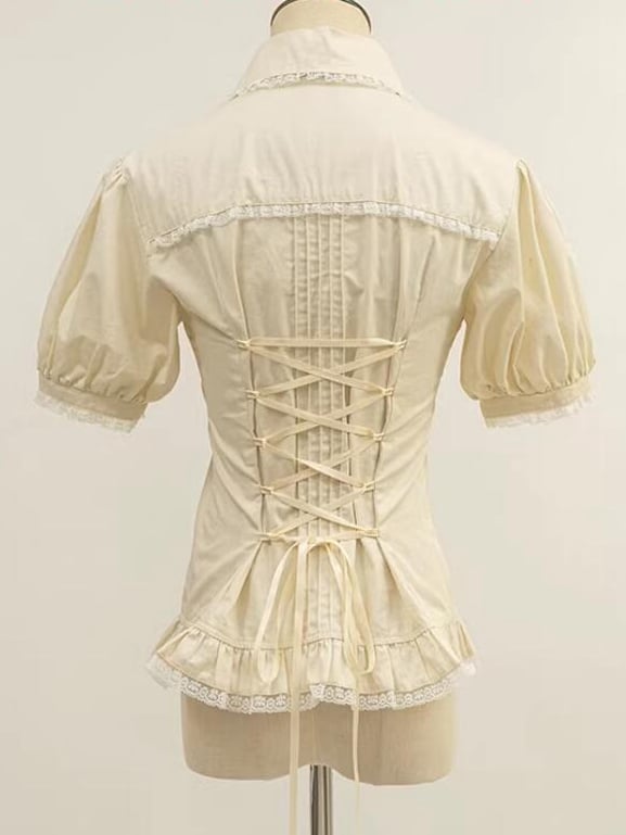 ベージュのプリーツボディスショートパフスリーブシャツ