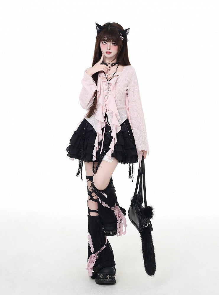 Top en mousseline rose à lacets noirs/clairs, ourlet asymétrique à volants et patte de boutonnage asymétrique