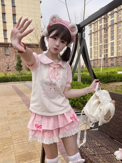 Spitzenbesatz, rosa Schleife, Stufenrock-Akzente