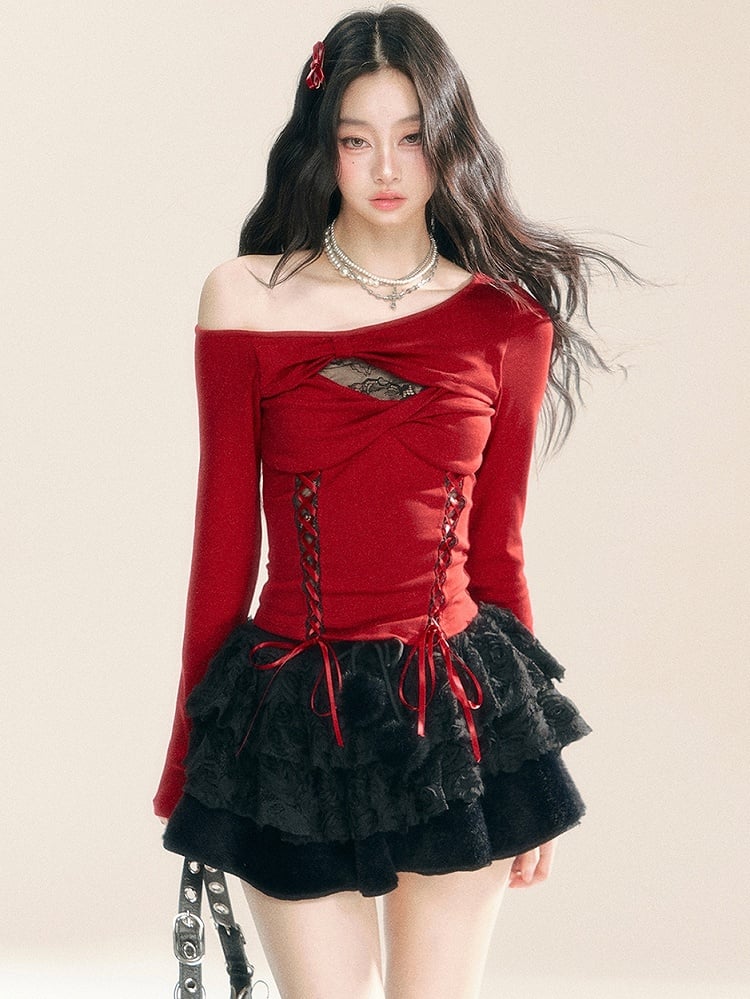 Haut en tricot rouge à découpes et lacets