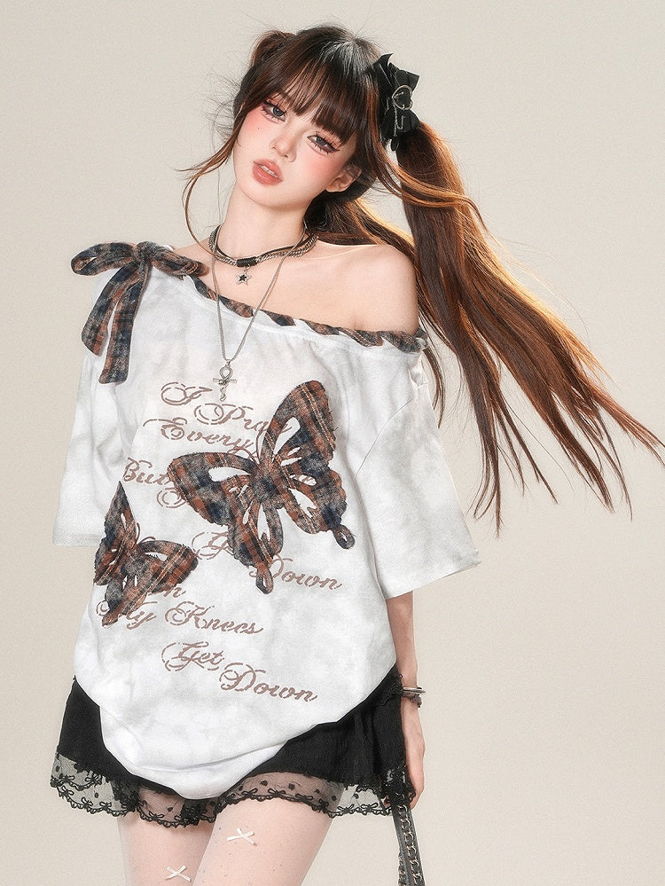 アップリケ付きブラウン/ホワイトのアシンメトリーなグラマラスTシャツ。チェック柄のバタフライ柄。ほろ苦いネックライン。