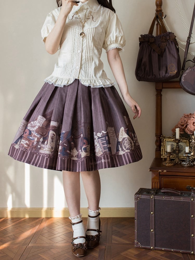 ベージュのプリーツボディスショートパフスリーブシャツ