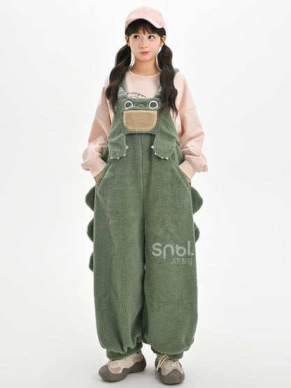 かわいい恐竜の緑のぬいぐるみオーバーオール