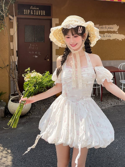 Süßes weißes Baskenkleid mit Puffärmeln und Neckholder und Blumenmuster