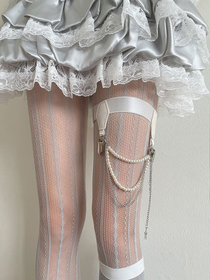 Leg with strands Black/White and Star-shaped charms Beaded Loop