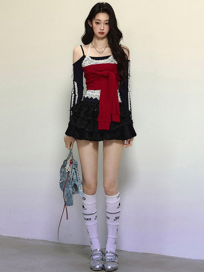 黒と赤の大胆なネクタイアクセントのホルターネック長袖トップス