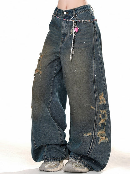 Denimblaue Distressed-Löcher-Jeans mit weitem Bein
