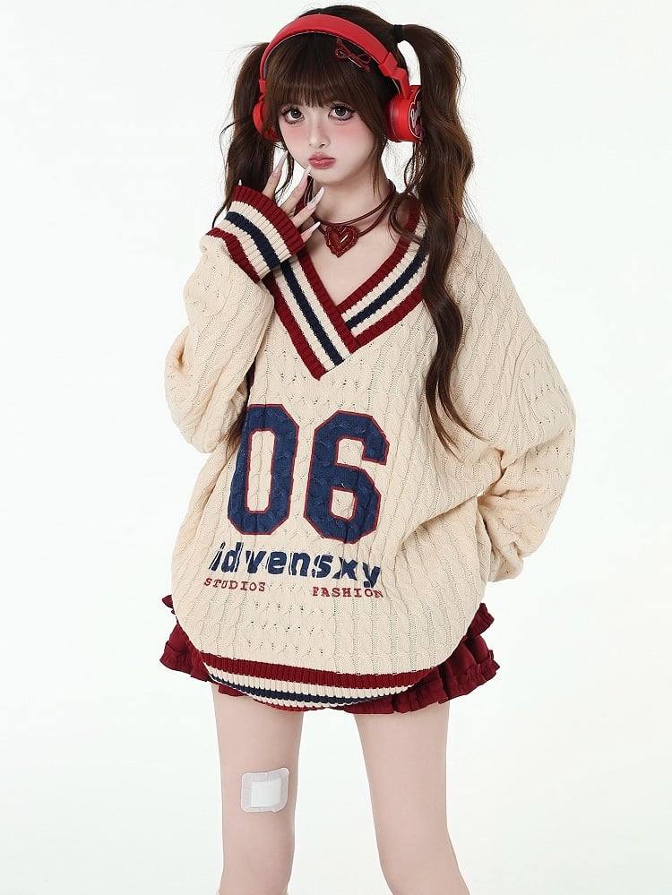Apricot Preppy Loose Sweater mit Zahlen und Buchstaben