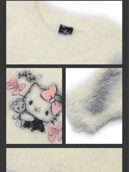 ミルクホワイトキティグラフィックディストレストリムルーズセーター