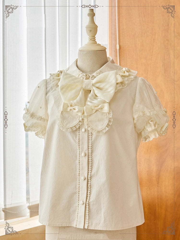 ベージュの取り外し可能な蝶結びネックラインビーズショートパフスリーブブラウス