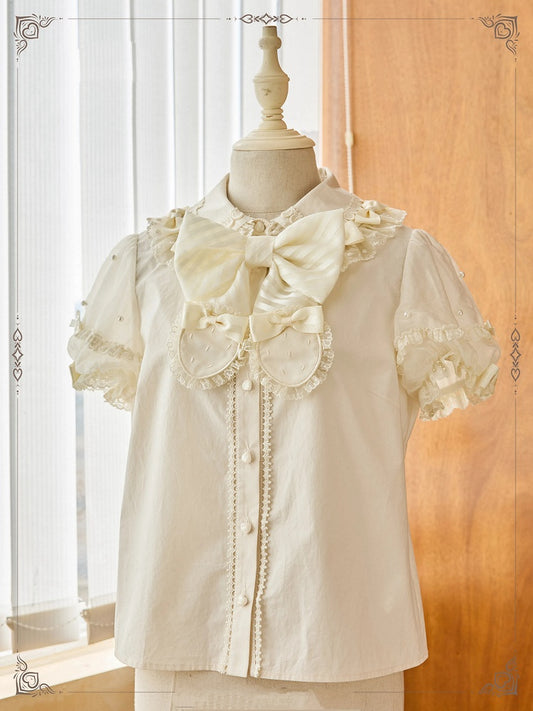 ベージュの取り外し可能な蝶結びネックラインビーズショートパフスリーブブラウス