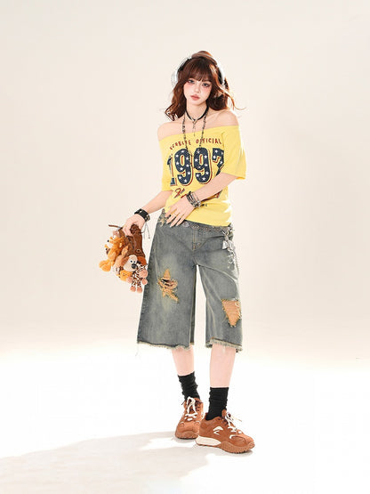 イエローのオフショルダーナンバープリントTシャツネックライン