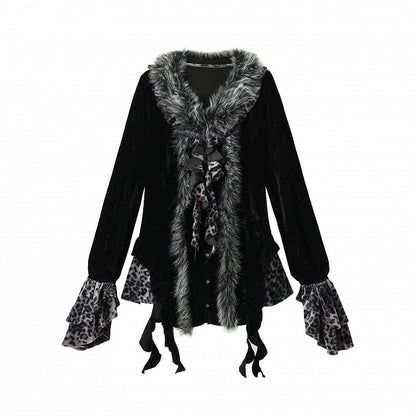 Schwarzes und graues Oberteil mit Leopardenmuster und zotteligem Besatz