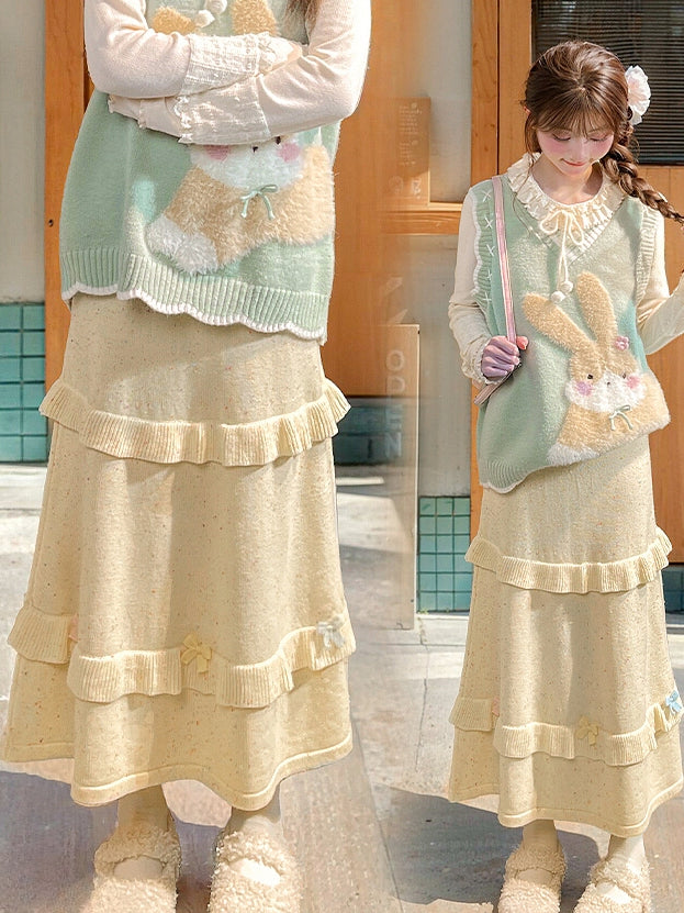 イエローのリボンがアクセントのハイウエストニットミディ丈スカート