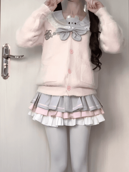 Jupe plissée à détails superposés gris rose