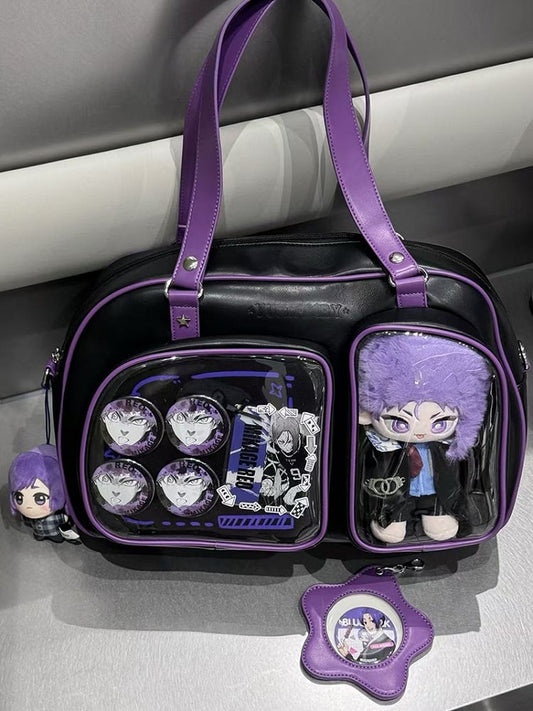 Brotförmige Ita-Umhängetasche in Schwarz und Lila mit Kontrastbesatz